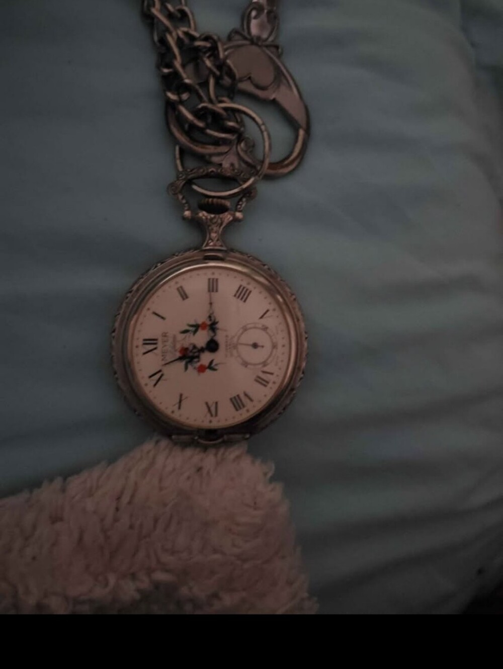 Vintage-Style Silver Pocket Watch with Floral Dial